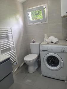 Appartements Petite Maison avec son jardin et acces independant a 14 mn de paris : photos des chambres