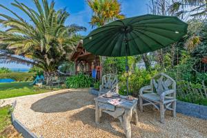 Chalets Chalet avec jardin vue mer 100m : photos des chambres