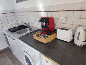 Appartements Le petit chateau : photos des chambres