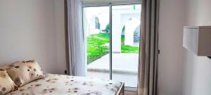 Magnifique Appartement de Luxe à Tanger avec Vue sur la Mer et Accès Piscine