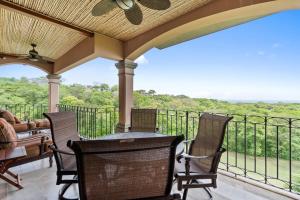 Stunning Luxury Penthouse in Exclusive Beachfront Community with Resort-Style Amenities & Sweeping Views of the Ocean & Golf Course