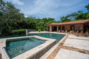 Stunning Luxury Penthouse in Exclusive Beachfront Community with Resort-Style Amenities & Sweeping Views of the Ocean & Golf Course