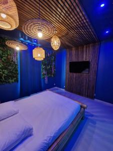Appartements Suite Tropicale avec jacuzzi YaoSpa60 : photos des chambres