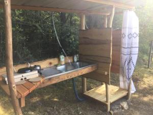 Tentes de luxe La roulotte du bonheur : photos des chambres