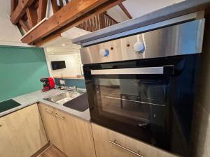 Appartements Mini-Loft, terrasse 24m2, Internet Haut-debit, garage prive et place de parking : photos des chambres
