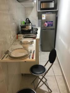 Albano habitación acústica cocina y baño