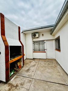 Departamento céntrico con cochera y patio con churrasquera