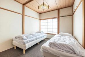 Max 28 ppl, 24 beds, 2 futons, BBQ & Darts & Karaoke, 2 parking