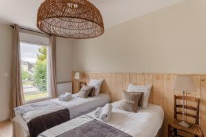Maisons de vacances La Cabane des Ebihens - A moins d-1km de la plage : photos des chambres