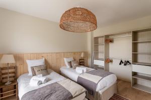 Maisons de vacances La Cabane des Ebihens - A moins d-1km de la plage : photos des chambres