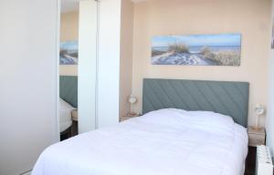 Appartements Le Freesia, a 20m de la plage, 5 min du centre-ville : photos des chambres