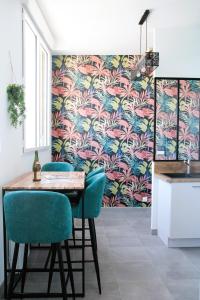 Appartements Le Freesia, a 20m de la plage, 5 min du centre-ville : photos des chambres