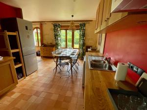 Maisons de vacances Maison avec jardin - L-Orangerie : photos des chambres