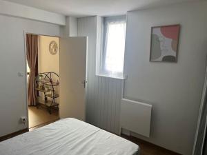 Appartements Appartement cosy - centre-ville : photos des chambres