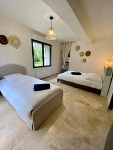 Maisons de vacances Superbe Moulin - Chateau Landon : photos des chambres