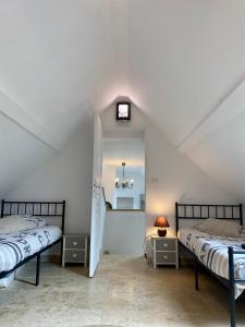 Maisons de vacances Superbe Moulin - Chateau Landon : photos des chambres