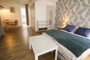 Appartements Monlogis 2 Grand Studio lumineux- Fibre : photos des chambres