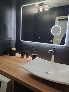 Appartements Au coin des Thermes - Draps en option : photos des chambres