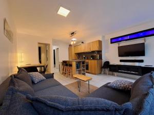 Appartements Au coin des Thermes - Draps en option : photos des chambres