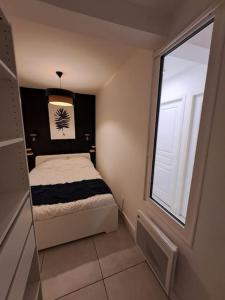 Appartements Au coin des Thermes - Draps en option : photos des chambres