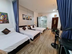 Phòng Deluxe 4 Người (Deluxe Quadruple Room)