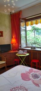 Appartements & Chambres Les Loges du Capucin : photos des chambres