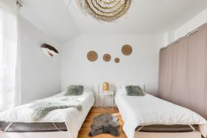 Maisons de vacances Maison neuve pour 8 - 500m plage du Rouvran : photos des chambres