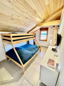 Appartements La TANIERE du LOUP : photos des chambres