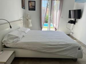 Villas Villa climatisee avec piscine : photos des chambres