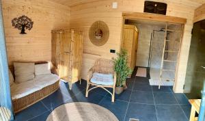 Chalets Chalet avec bain nordique et sauna : photos des chambres