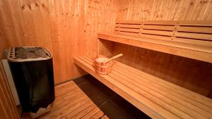 Chalets Chalet avec bain nordique et sauna : photos des chambres