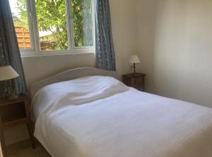 Appartements La Canuche Appartement avec jardin : photos des chambres