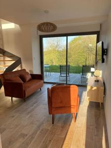 Maisons de vacances Gite a 10 min de Dinan avec bain nordique privatif : photos des chambres