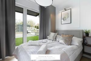4 stars, Butterfly Apartments by SummerWinter Gdynia Orłowo Apartamenty premium, parking, winda, rowerownia, driving golf