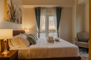 2 BR 5 pax Spacious Elegant Condo in Saint Dominique, Megaworld, Iloilo City