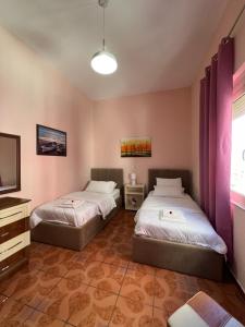 Twin Room with City View room in Hotel Gega