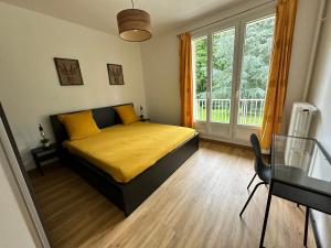 Appartements F3 verdoyant proche Paris Saclay : photos des chambres