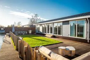 Waterfront tiny home with spacious garden - Groenlandsekade