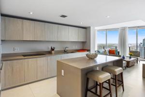 Corner condo, Wraparound Balcony Ocean and City Views at LYFE Resort