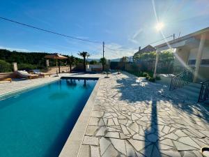 Sunny village, pool house