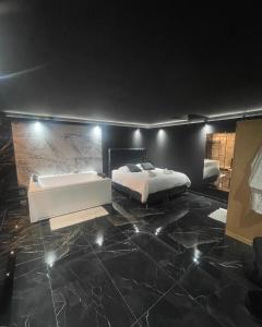 Appartements La Suite Prestige Jacuzzi,Sauna,Netflix,Disney : photos des chambres