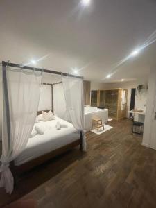 Appartements La Suite Bali Jacuzzi,Sauna,Netflix,Disney : photos des chambres