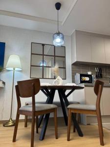 Cozy Condo in Clark Pampanga with Free Parking & Pool Access