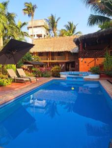 HOTELITO SWISS OASIS, Playa Zicatela - Adults Only - Kitchen - Cocina