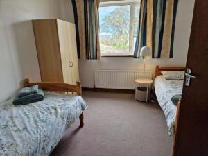 Houses by the Sea An Fód Dubh