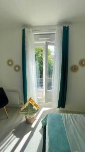 Appartements Cosy au Coeur de Dijon : photos des chambres