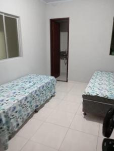 Próximo praia e aeroporto