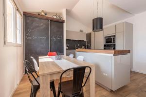 Maisons de vacances Belle maison climatisee - MEET - Aeroscopia - TRAMWAY : photos des chambres