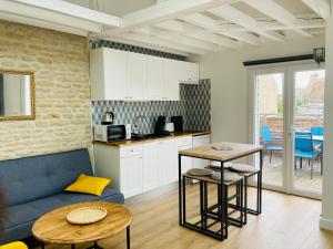Appartements Joli F2 avec terrasse 150m plage : photos des chambres
