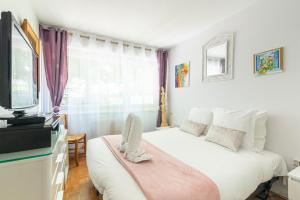 Appartements Le Paradis Botanique - Bel appt a 30min de Paris : photos des chambres